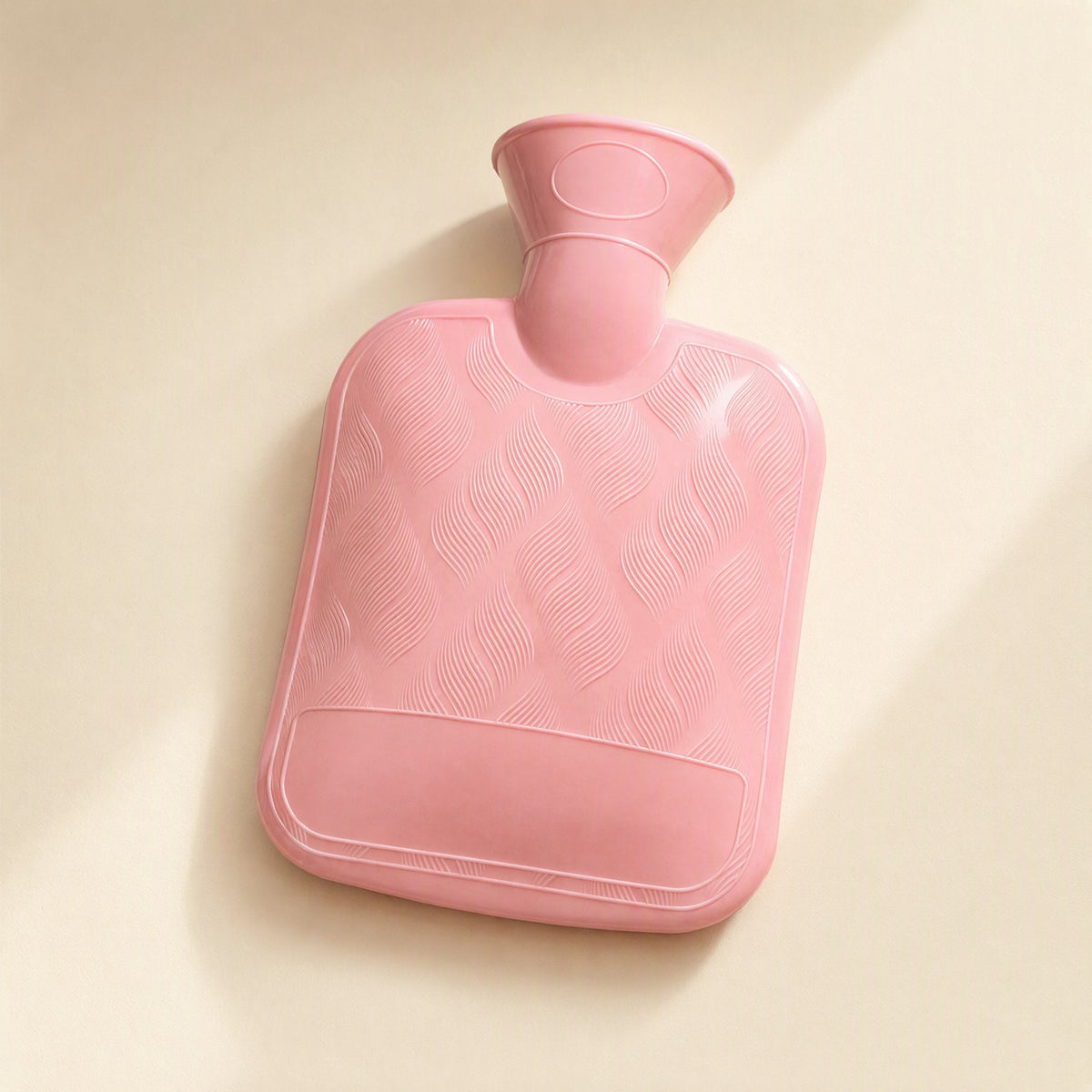 PVC hot water bottle with a water-filled inner liner