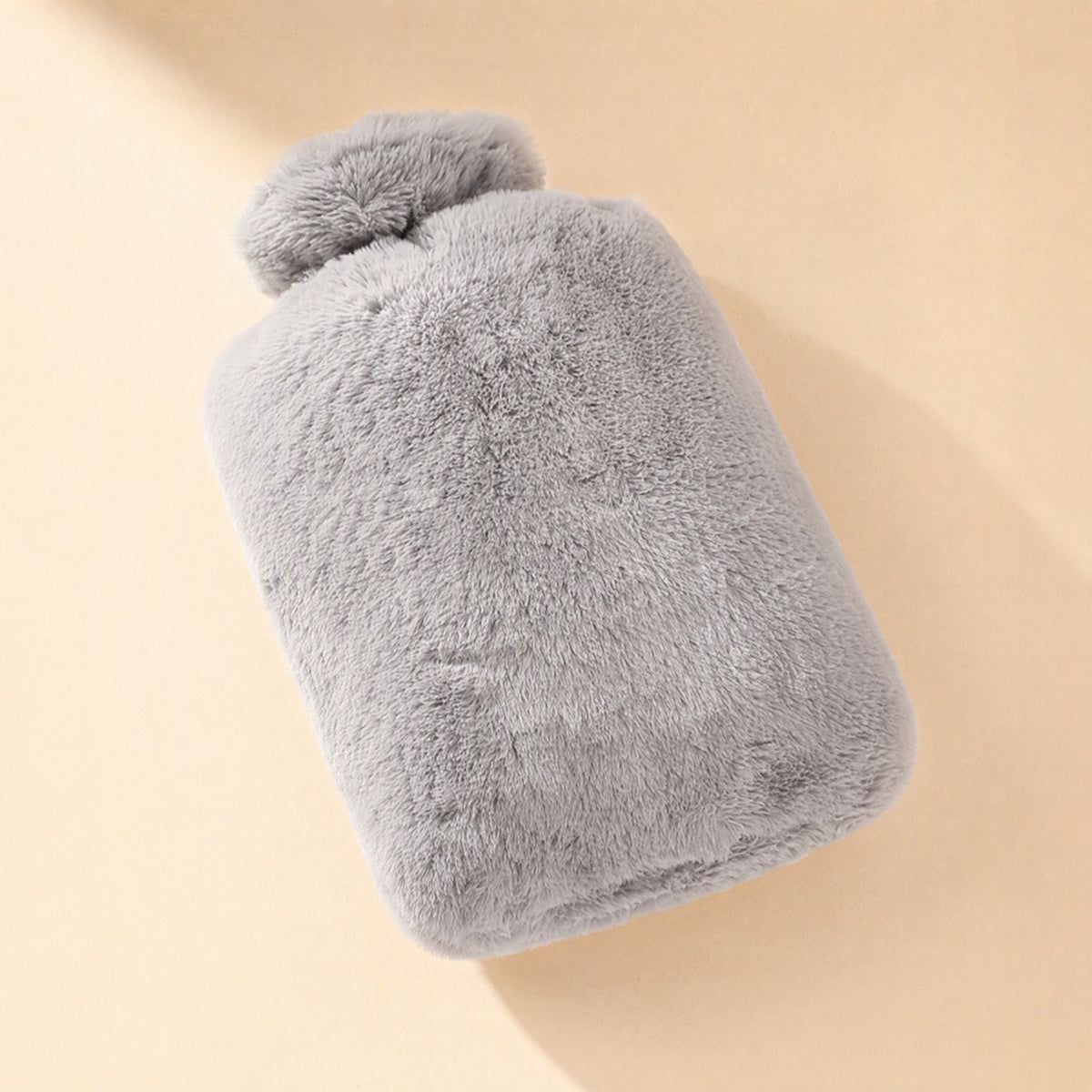 Water-filled hot water bag with removable cloth cover